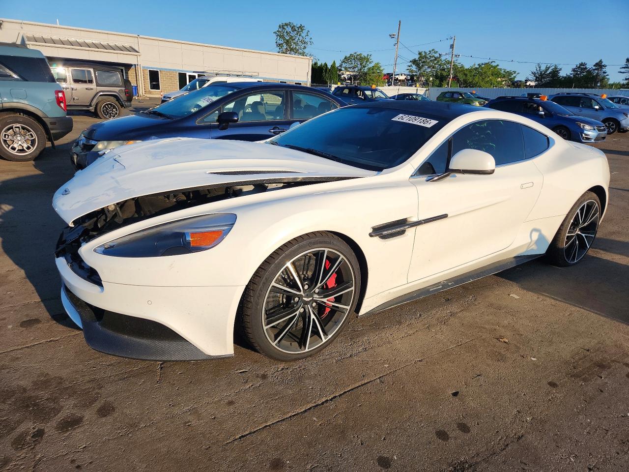 2014 Aston Martin V12 Vanquish VIN SCFLDCFP2EGJ00902 COPART salvage auction — Front End, St - Salvage Title, sold $31,750 on 2026-09-25 (photo 1)