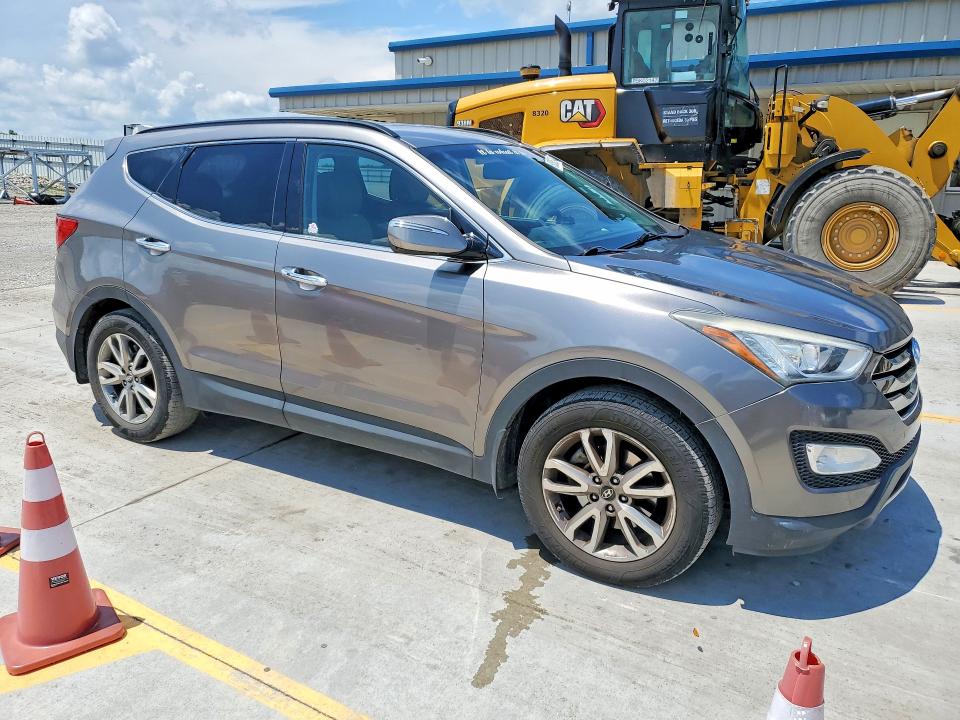 2014 Hyundai Santa fe VIN 5XYZU3LA2EG140716 COPART salvage auction — NORMAL WEAR, Tn - Certificate Of Title, sold $1,800 on 2026-07-23 (photo 4)