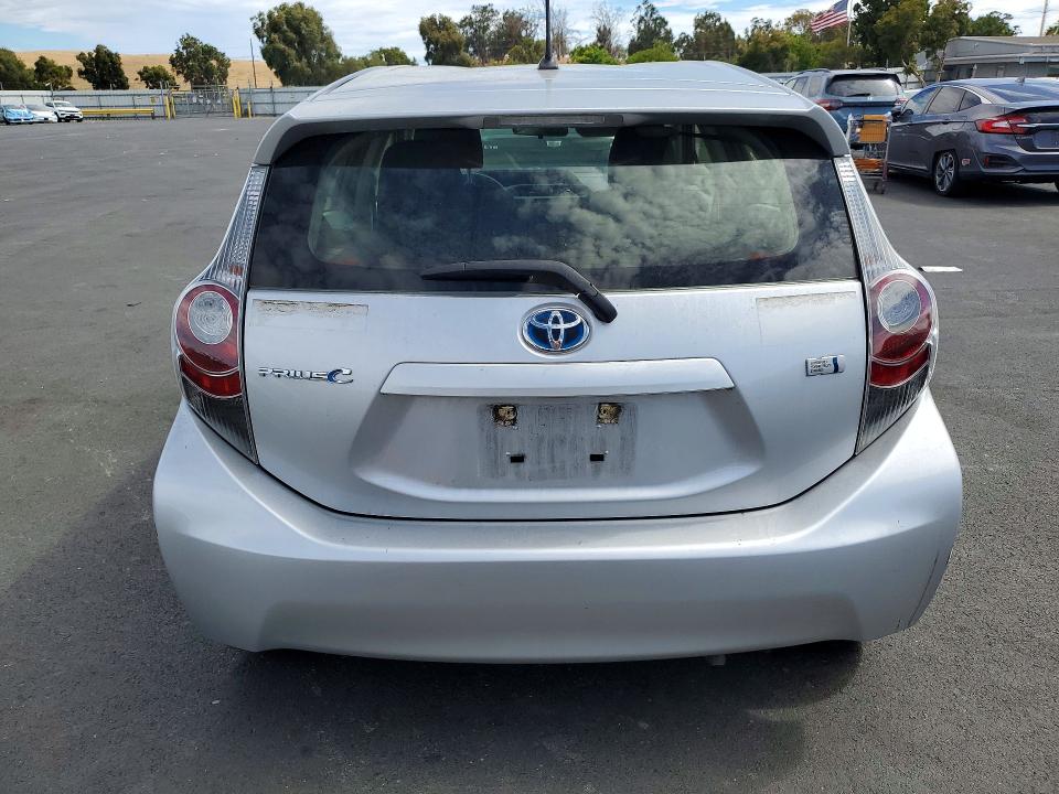 2014 Toyota Prius c VIN JTDKDTB39E1571199 COPART salvage auction — SIDE, CA - SALVAGE CERTIFICATE, sold $950 on 2026-07-27 (photo 6)