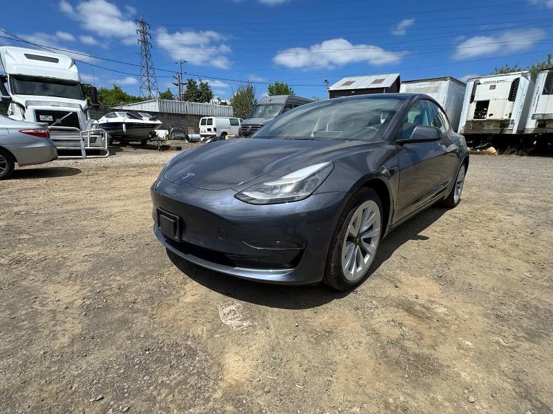 2022 Tesla Model 3 VIN 5YJ3E1EA5NF185418 COPART salvage auction — NORMAL WEAR, OR - CERTIFICATE OF TITLE (P), sold $22,300 on 2026-07-28 (photo 2)