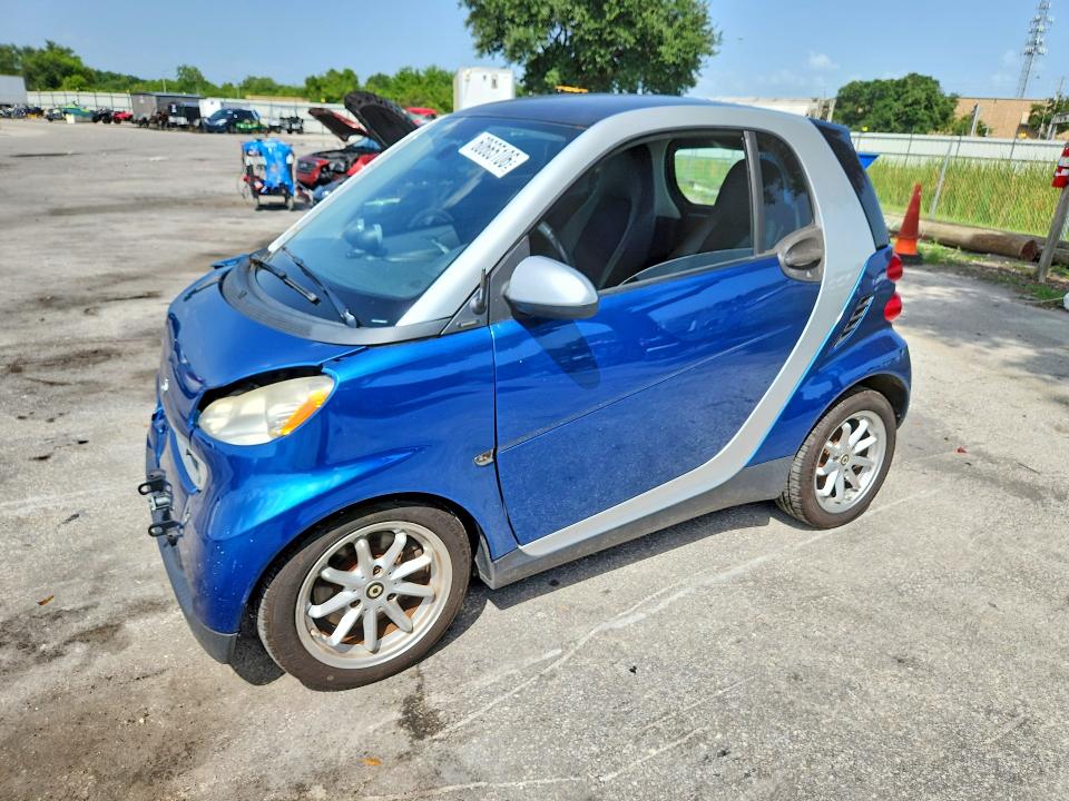 2009 Smart Fortwo VIN WMEEJ31X59K254712 COPART salvage auction — FRONT END, FL - CERT OF TITLE SLVG REBUILDABLE, sold $15 on 2026-07-21 (photo 1)