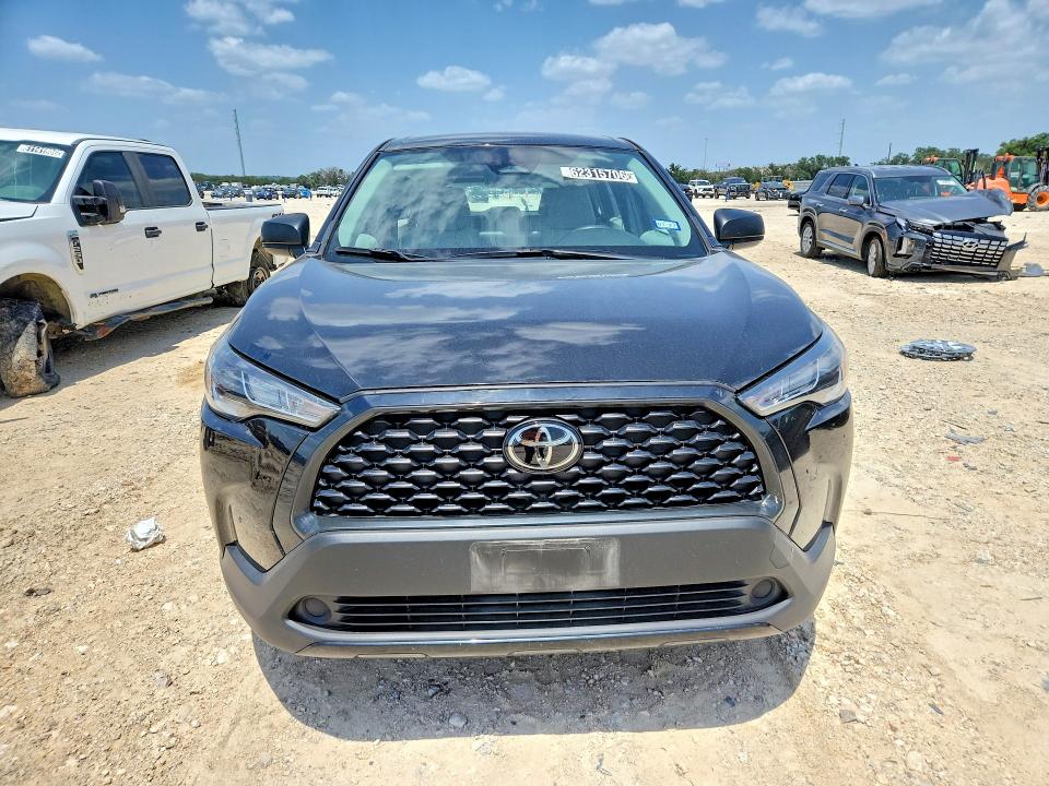 2024 Toyota Corolla cross VIN 7MUAAAAG6RV077474 COPART salvage auction — SIDE, Tx - Certificate Of Title (P), sold $6,600 on 2026-07-29 (photo 5)