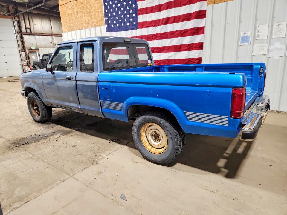 1989 Ford Ranger VIN 1FTCR15T2KPA32065 COPART salvage auction — MINOR DENT/SCRATCHES, Ak - Cert Of Veh Title-Reconstructe, sold $450 on 2026-08-04 (photo 2)