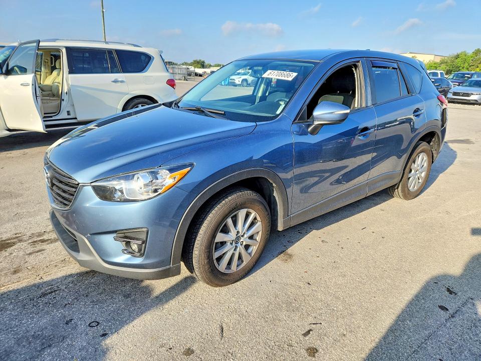 2016 Mazda Cx-5 VIN JM3KE4CY1G0882414 COPART salvage auction — REAR END, Fl - Cert Of Title Slvg Rebuildable, sold $1,400 on 2026-07-28 (photo 1)
