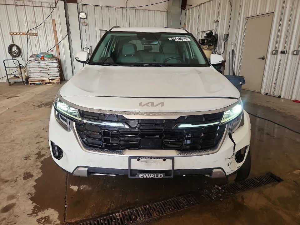2024 Kia Seltos VIN KNDETCA78R7505976 COPART salvage auction — SIDE, WI - CERT OF TITLE-CLAIM PAID, sold $7,100 on 2026-08-17 (photo 5)