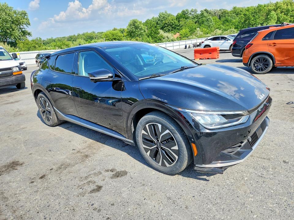 2022 Kia Ev6 VIN KNDC3DLC2N5043279 COPART salvage auction — MINOR DENT/SCRATCHES, Wv - Certificate Of Title (P), sold $4,600 on 2026-07-14 (photo 4)