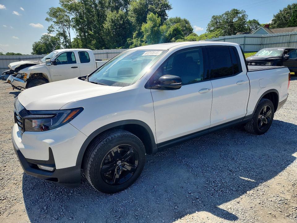 2023 Honda Ridgeline VIN 5FPYK3F86PB006559 COPART salvage auction — SIDE, Nc - Salvage Certificate Of Title, sold $16,600 on 2026-08-19 (photo 1)