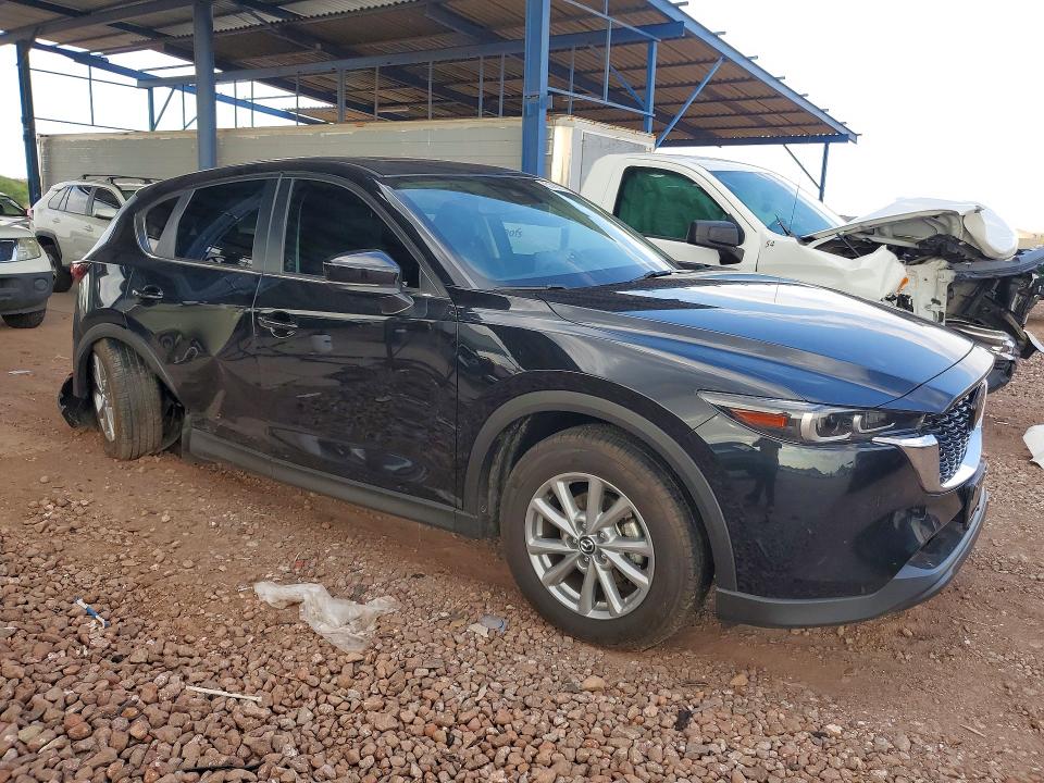 2023 Mazda Cx-5 VIN JM3KFBCM4P0217490 COPART salvage auction — SIDE, AZ - CERT OF TITLE - SALVAGE, sold $1,600 on 2026-07-28 (photo 4)