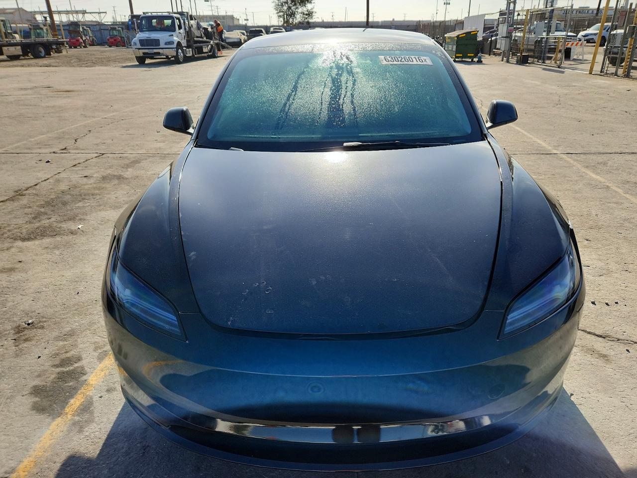 2025 Tesla Model 3 VIN 5YJ3E1EA3SF980608 COPART salvage auction — Front End, TX - DIS/DLR/EXP ONLY SALVAGE TITLE, sold $15,000 on 2026-09-17 (photo 5)