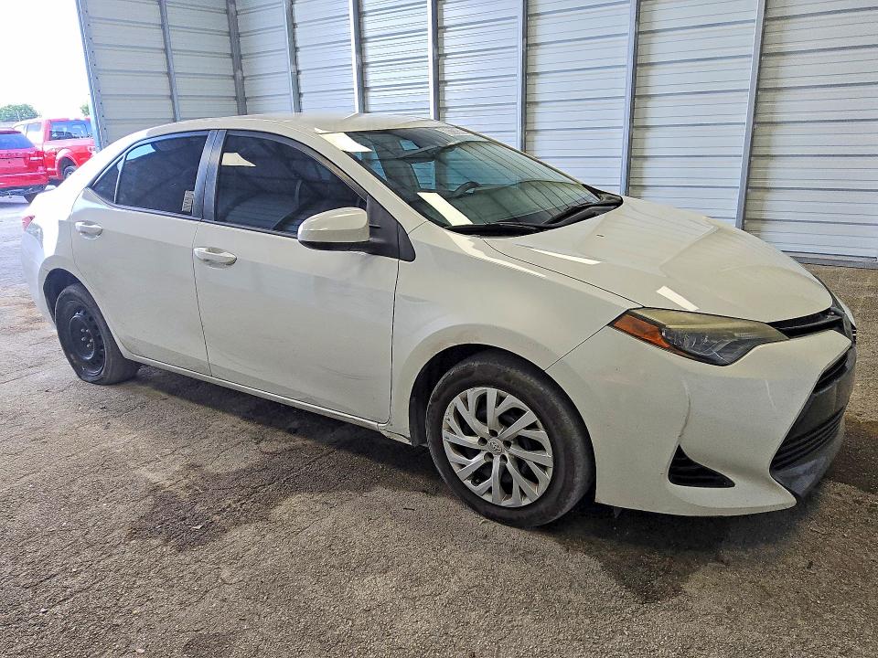 2018 Toyota Corolla VIN 5YFBURHEXJP783692 COPART salvage auction — MINOR DENT/SCRATCHES, FL - CERTIFICATE OF TITLE, sold $3,350 on 2026-07-28 (photo 4)