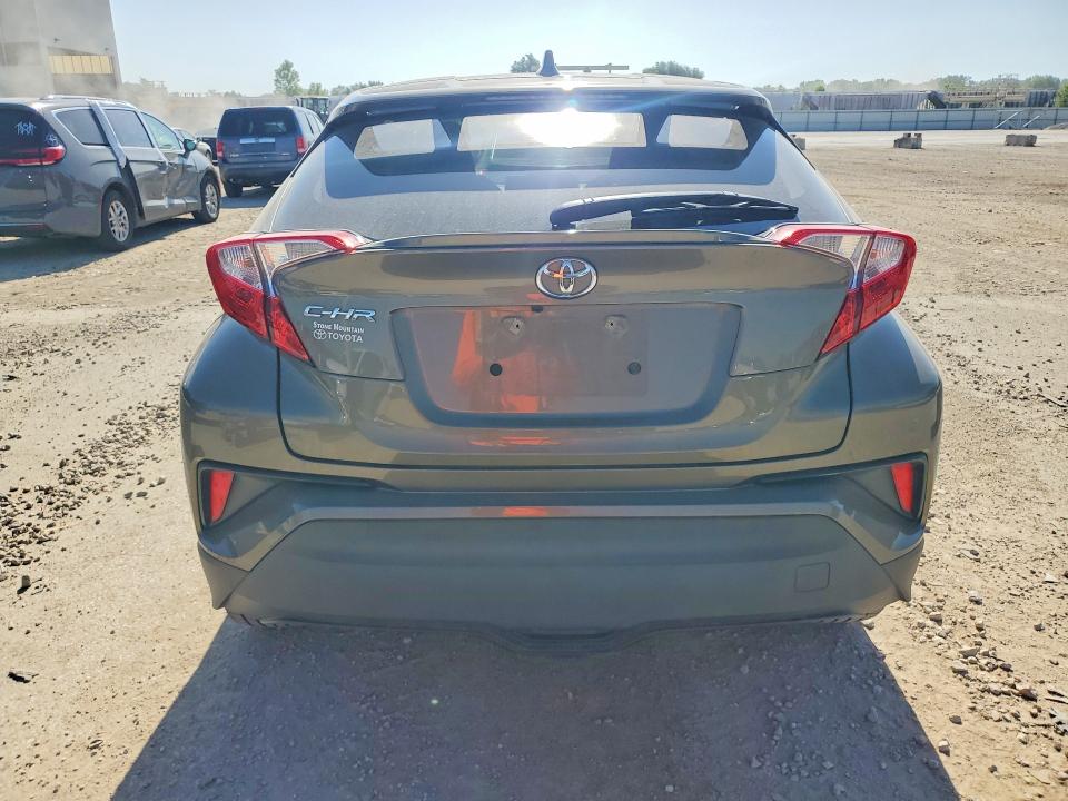 2021 Toyota C-hr VIN NMTKHMBX2MR126705 COPART salvage auction — MINOR DENT/SCRATCHES, Ks - Certificate Of Title, sold $3,350 on 2026-07-30 (photo 6)