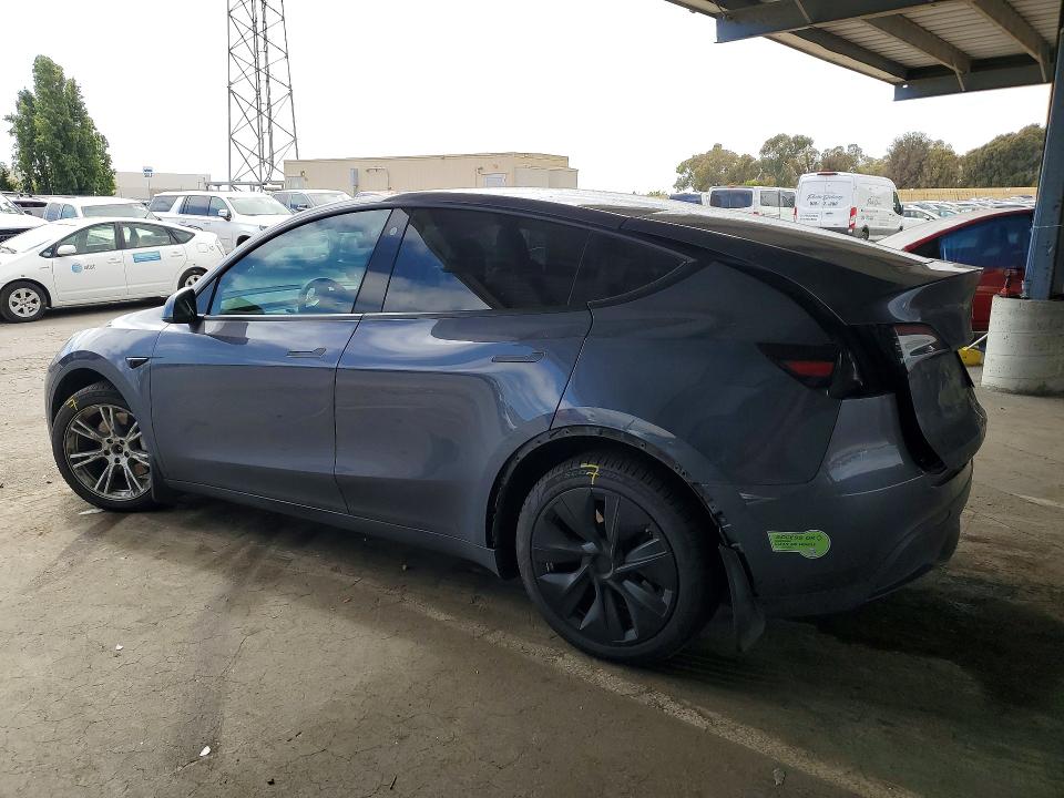 2023 Tesla Model y VIN 7SAYGDEE5PF635305 COPART salvage auction — REAR END, Ca - Salvage Certificate, sold $7,600 on 2026-07-14 (photo 2)