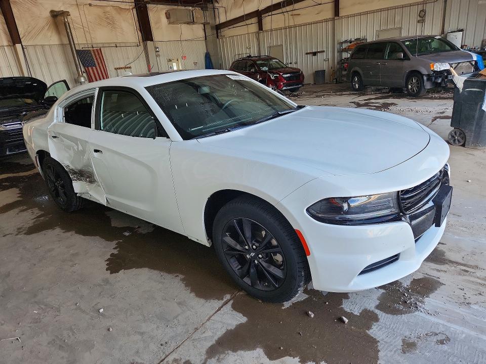 2023 Dodge Charger VIN 2C3CDXJG7PH541837 COPART salvage auction — SIDE, WI - CERT OF TITLE-CLAIM PAID, sold $11,700 on 2026-08-31 (photo 4)