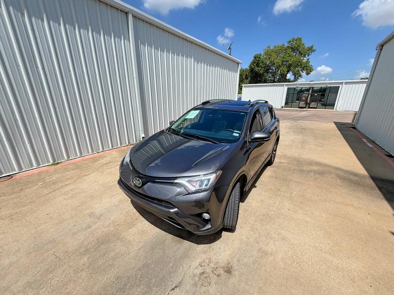2017 Toyota Rav4 VIN JTMWFREV8HJ711890 COPART salvage auction — MINOR DENT/SCRATCHES, TX - CERTIFICATE OF TITLE (P), sold $29,500 on 2026-07-25 (photo 2)