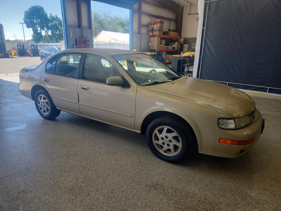 1998 Nissan Maxima VIN JN1CA21D3WM916456 COPART salvage auction — MINOR DENT/SCRATCHES, Ca - Dis/Dlr/Exp Only Clean Title, sold $125 on 2026-07-31 (photo 4)