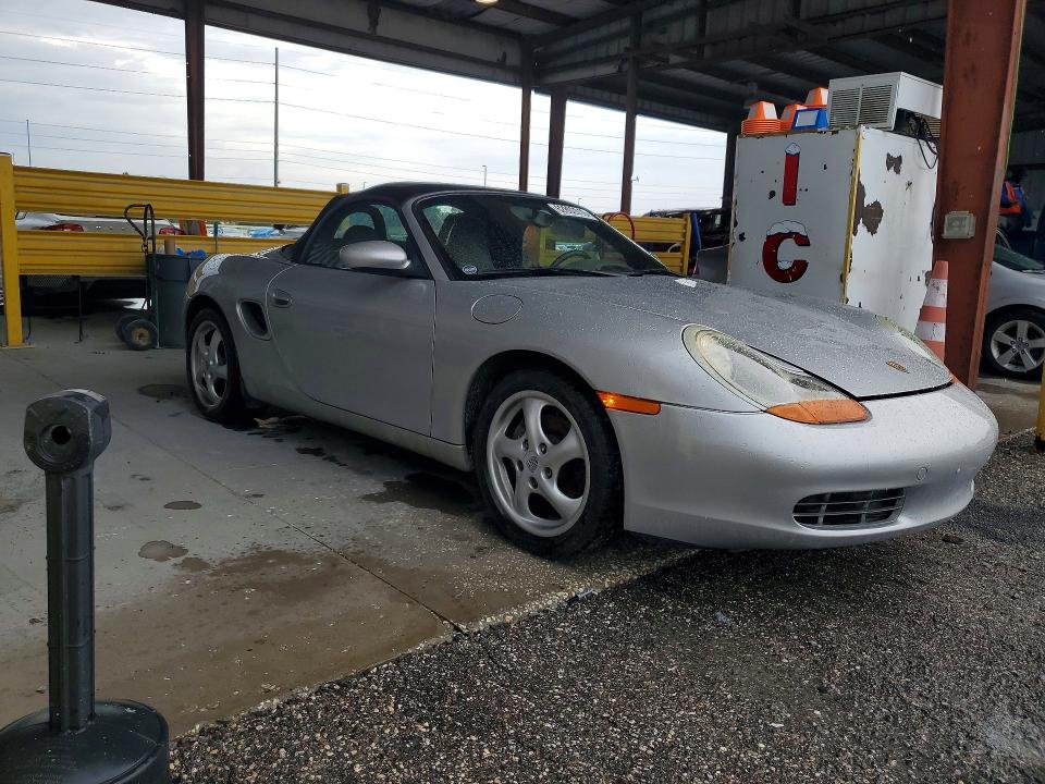 1999 Porsche Boxster VIN WP0CA298XXU629833 COPART salvage auction — NORMAL WEAR, Fl - Certificate Of Title, sold $1,850 on 2026-08-04 (photo 4)