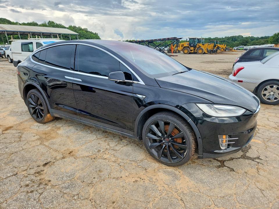 2016 Tesla Model x VIN 5YJXCAE28GF002368 COPART salvage auction — MINOR DENT/SCRATCHES, Mt - Certificate Of Title, sold $4,200 on 2026-07-28 (photo 4)