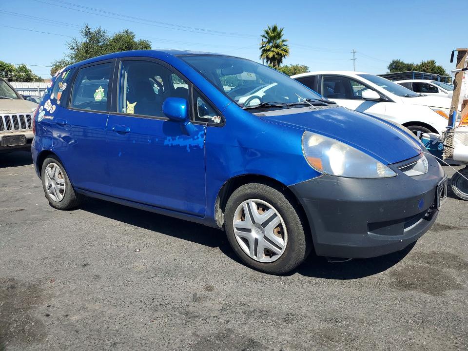 2007 Honda Fit VIN JHMGD38417S013963 COPART salvage auction — SIDE, CA - SALVAGE CERTIFICATE, sold $525 on 2026-07-14 (photo 4)