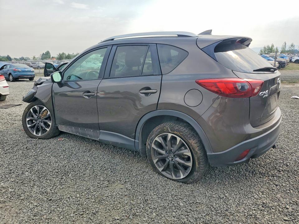 2016 Mazda Cx-5 VIN JM3KE4DY3G0909871 COPART salvage auction — SIDE, Or - Salvage Title Certificate, sold $1,600 on 2026-09-08 (photo 2)