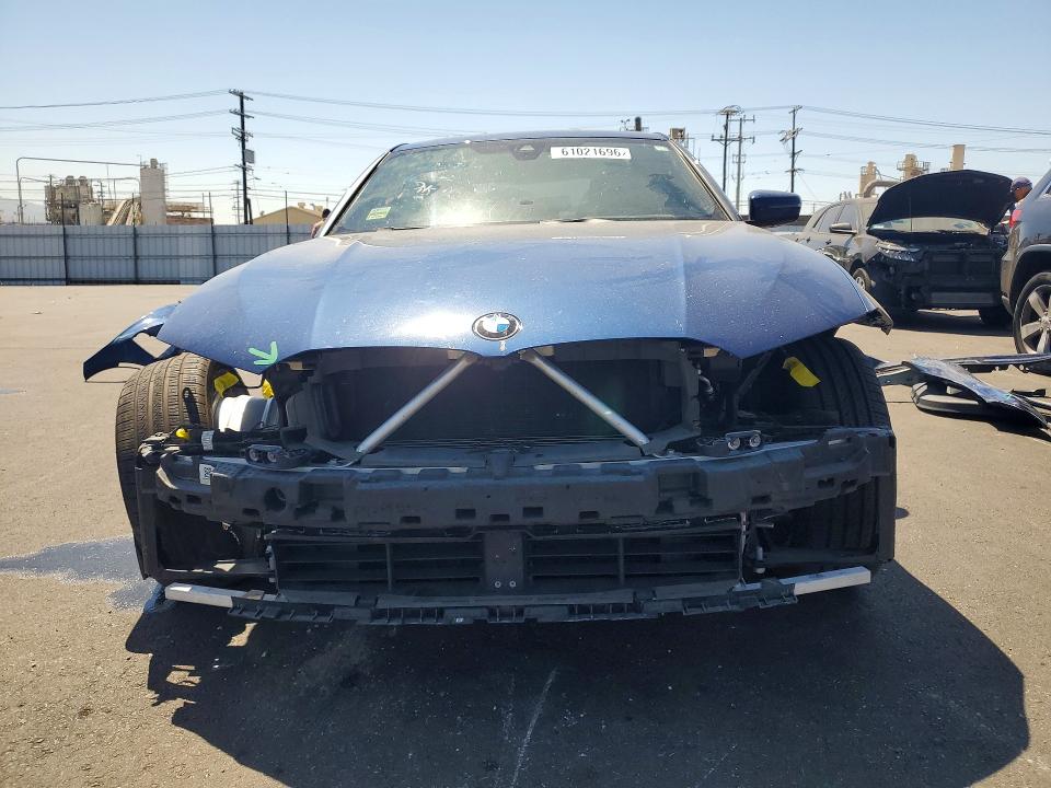 2023 BMW 3er VIN 3MW69FF00P8D57993 COPART salvage auction — FRONT END, Ca - Salvage Certificate, sold $11,400 on 2026-08-24 (photo 5)