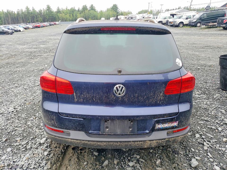2014 Volkswagen Tiguan VIN WVGJV3AXXEW624990 COPART salvage auction — WATER/FLOOD, Ns - Cert Of Registration, sold $225 on 2026-08-13 (photo 6)