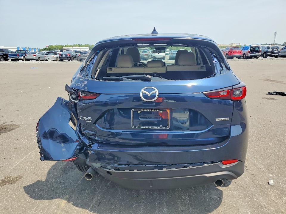 2023 Mazda Cx-5 VIN JM3KFBBM6P0144754 COPART salvage auction — REAR END, Fl - Cert Of Title Slvg Rebuildable, sold $7,100 on 2026-09-09 (photo 6)
