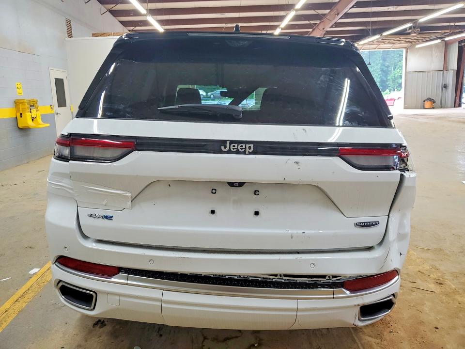 2022 Jeep Grand cherokee VIN 1C4RJYE61N8755991 COPART salvage auction — FRAME DAMAGE, Tn - Certificate Of Title, sold $19,500 on 2026-07-29 (photo 6)