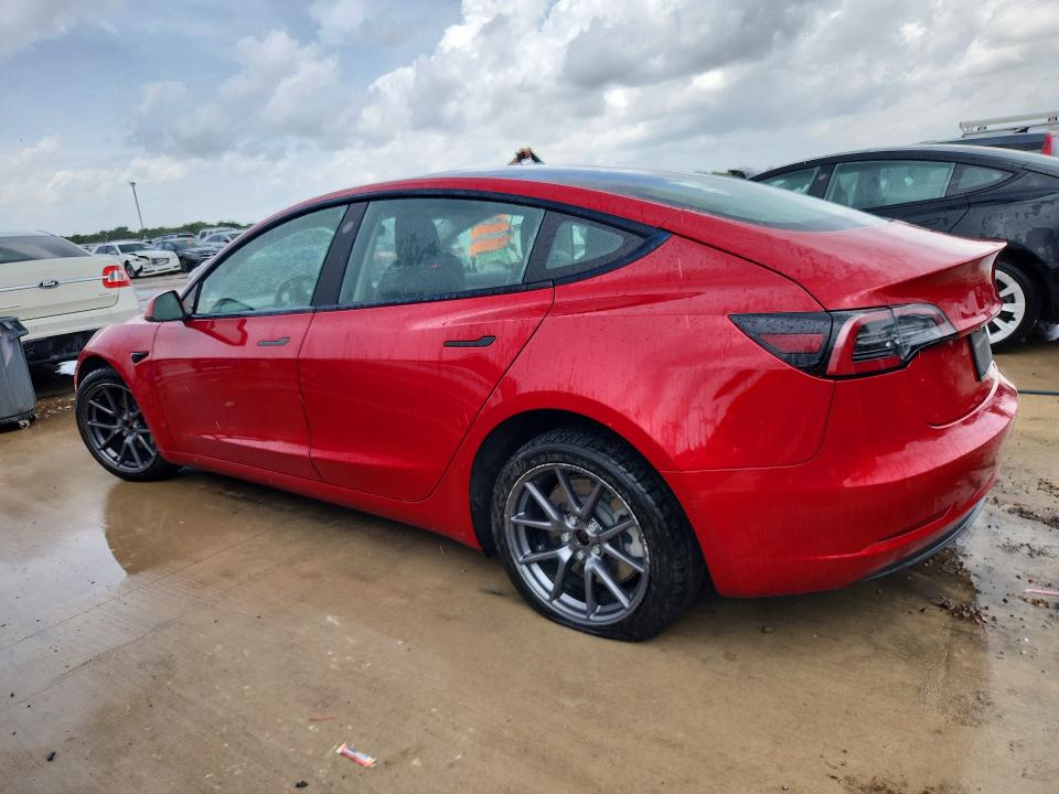 2022 Tesla Model 3 VIN 5YJ3E1EB6NF287545 COPART salvage auction — SIDE, TX - CERTIFICATE OF TITLE, sold $7,200 on 2026-07-27 (photo 2)