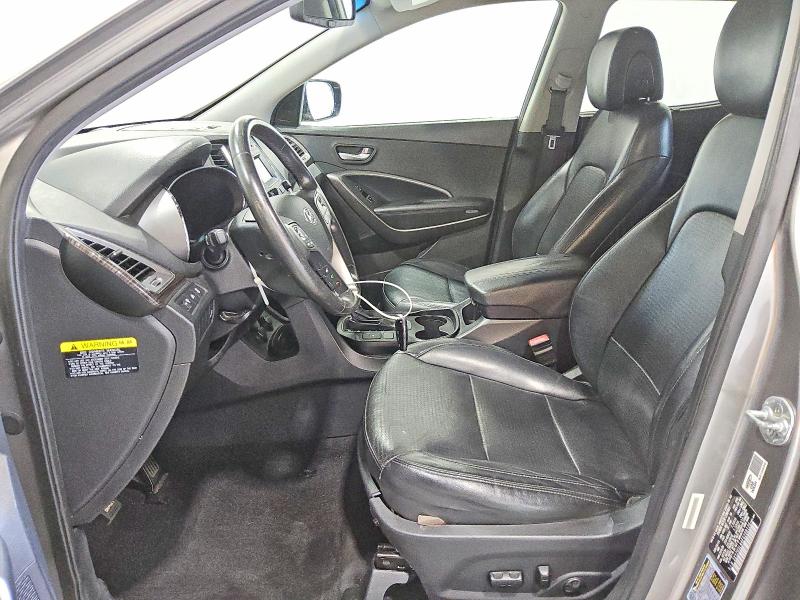 2014 Hyundai Santa fe VIN 5XYZU3LA4EG208126 COPART salvage auction — MECHANICAL, FL - CERTIFICATE OF TITLE, sold $725 on 2026-07-14 (photo 7)