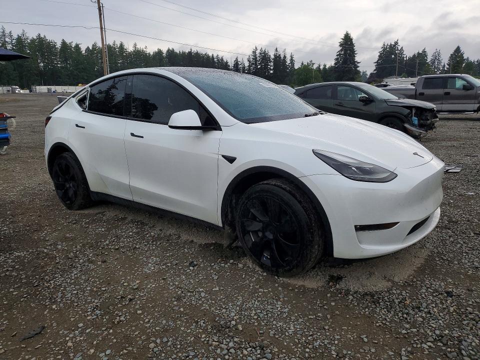 2023 Tesla Model y VIN 7SAYGDEEXPF682572 COPART salvage auction — REAR END, Salvage Title, sold $2,600 on 2026-07-21 (photo 4)