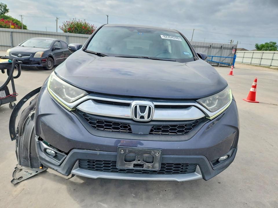 2019 Honda Cr-v VIN 7FARW1H54KE031904 COPART salvage auction — SIDE, TX - SALVAGE VEHICLE TITLE, sold $7,000 on 2026-08-22 (photo 5)
