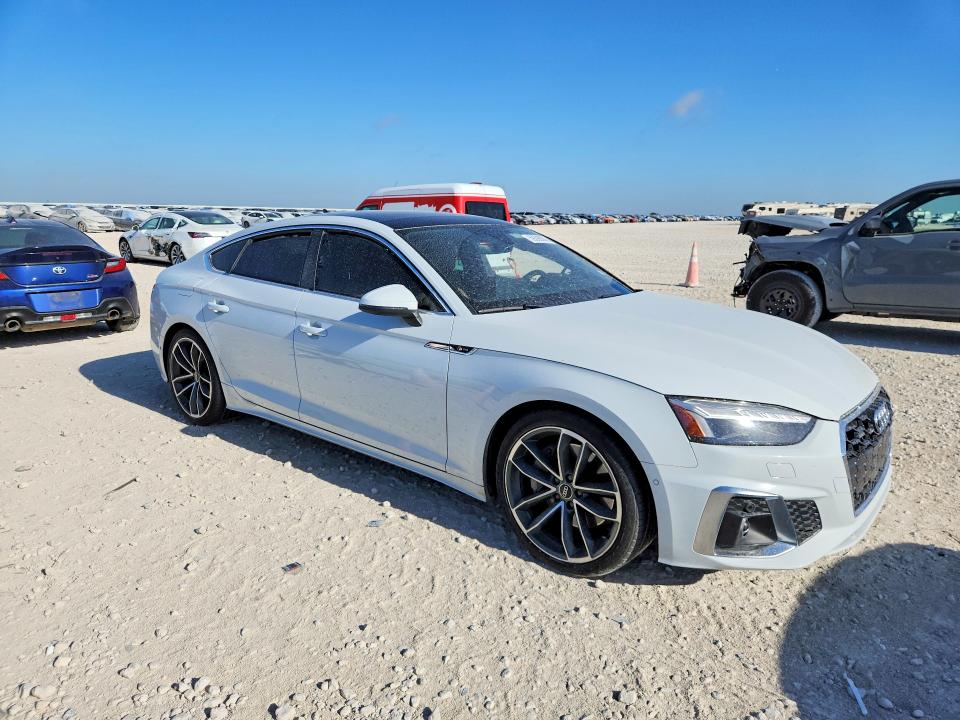 2024 Audi A5 VIN WAUEACF53RA069373 COPART salvage auction — SIDE, Tx - Salvage Vehicle Title, sold $7,800 on 2026-07-16 (photo 4)