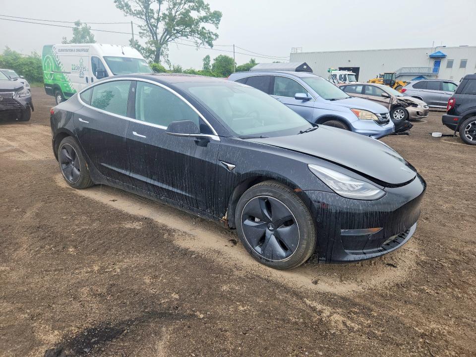 2018 Tesla Model 3 VIN 5YJ3E1EA7JF095617 COPART salvage auction — MINOR DENT/SCRATCHES, Qc - Aucune Mention, sold $9,300 on 2026-07-29 (photo 4)
