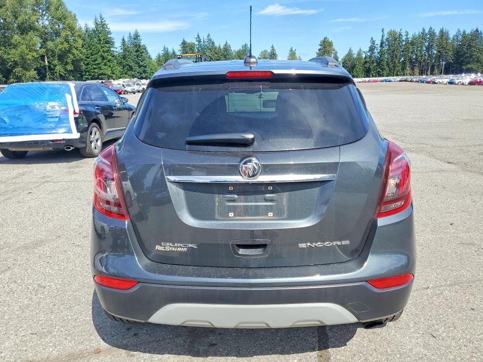 2018 Buick Encore VIN KL4CJASB3JB704322 COPART salvage auction — MECHANICAL, Wa - Vehicle Cert Of Ownership-Titl, sold $400 on 2026-08-31 (photo 6)