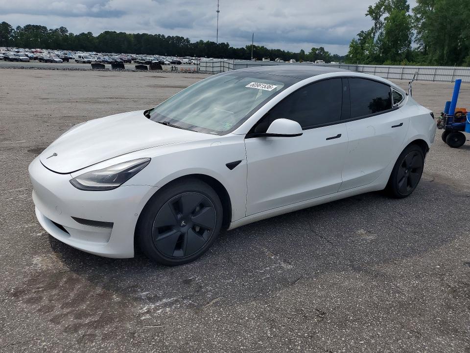 2021 Tesla Model 3 VIN 5YJ3E1EA5MF048865 COPART salvage auction — REAR END, Nc - Salvage Certificate Of Title, sold $325 on 2026-07-28 (photo 1)