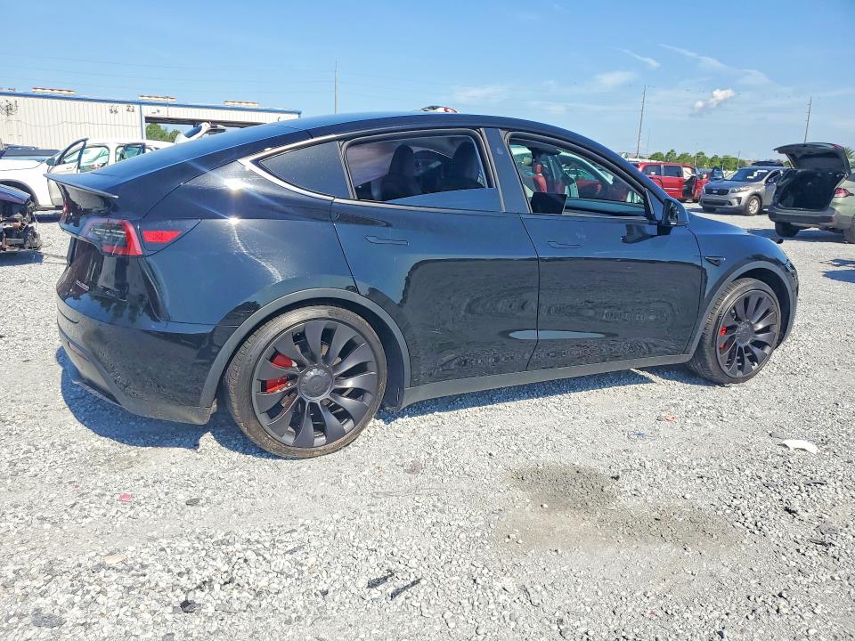 2023 Tesla Model y VIN 7SAYGDEF6PF844075 COPART salvage auction — SIDE, Fl - Cert Of Title Slvg Rebuildable, sold $9,700 on 2026-07-31 (photo 3)