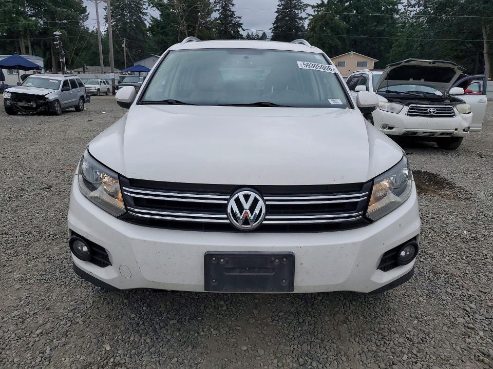 2012 Volkswagen Tiguan VIN WVGBV7AX8CW581906 COPART salvage auction — MINOR DENT/SCRATCHES, Wa - Vehicle Cert Of Ownership-Titl, sold $1,000 on 2026-07-14 (photo 5)