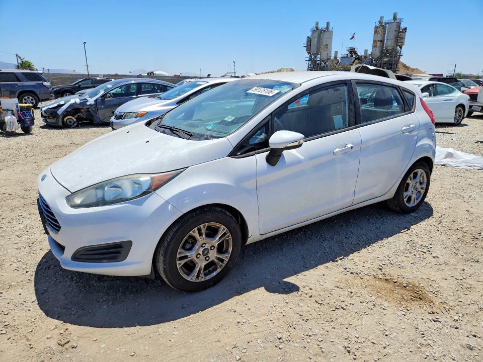 2014 Ford Fiesta VIN 3FADP4EJ1EM121636 COPART salvage auction — MINOR DENT/SCRATCHES, Ca - Dis/Dlr/Exp Only Clean Title, sold $300 on 2026-07-10 (photo 1)