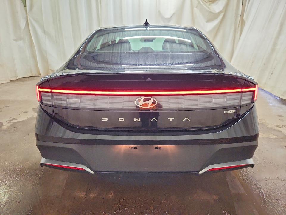 2026 Hyundai Sonata hybrid VIN KMHL24JJ8TA172714 COPART salvage auction — WATER/FLOOD, FL - CERT OF TITLE-SLVG REBLD FLOOD (P), sold $8,900 on 2026-07-27 (photo 6)