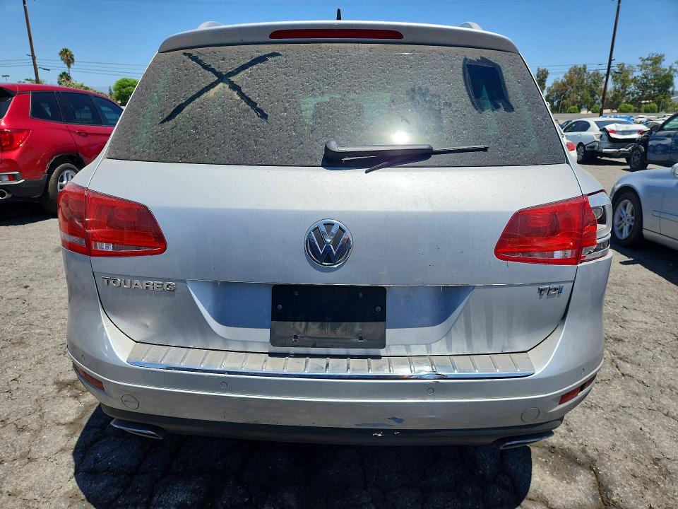 2012 Volkswagen Touareg VIN WVGFK9BPXCD004486 COPART salvage auction — SIDE, CA - DIS/DLR/EXP ONLY CLEAN TITLE, sold $1,850 on 2026-08-10 (photo 6)