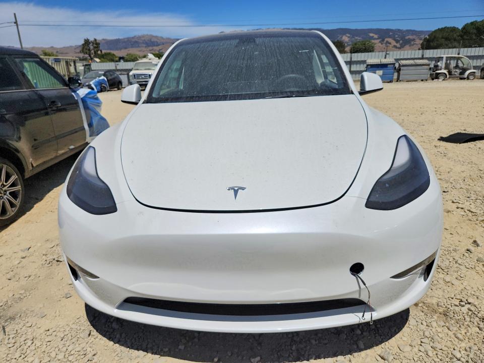 2023 Tesla Model y VIN 7SAYGDEE8PF690587 COPART salvage auction — REAR END, CA - SALVAGE CERTIFICATE, sold $2,300 on 2026-07-28 (photo 5)