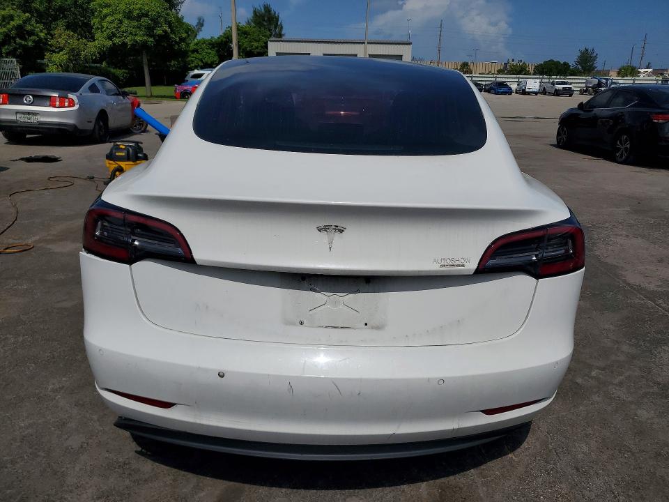 2018 Tesla Model 3 VIN 5YJ3E1EA7JF007505 COPART salvage auction — REAR END, Fl - Certificate Of Title, sold $4,450 on 2026-07-27 (photo 6)