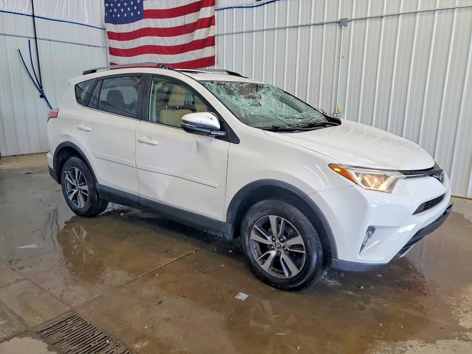 2017 Toyota Rav 4 VIN JTMRFREV5HJ144728 COPART salvage auction — ROLLOVER, Pa - Certificate Of Salvage, sold $525 on 2026-07-29 (photo 4)