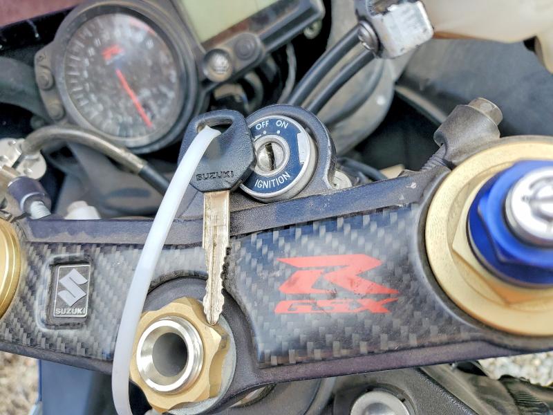 2004 Suzuki Gsx-r750 k VIN JS1GR7JA642104937 COPART salvage auction — SIDE, Ok - Certificate Of Title, sold $1,650 on 2026-07-20 (photo 8)