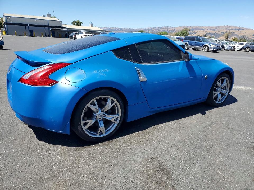 2011 Nissan 370z VIN JN1AZ4EHXBM551762 COPART salvage auction — VANDALISM, Fl - Dis/Dlr/Exp Only Salvage Title, sold $5,100 on 2026-07-28 (photo 3)