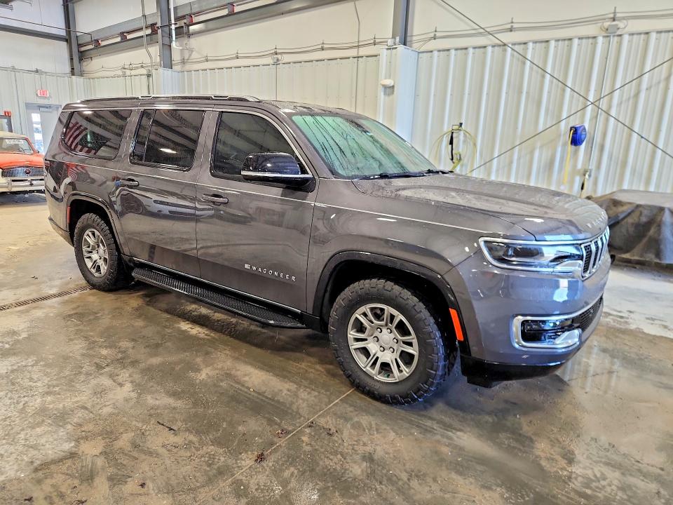 2023 Jeep Wagoneer VIN 1C4SJSAPXPS502686 COPART salvage auction — MINOR DENT/SCRATCHES, MO - CERTIFICATE OF TITLE, sold $12,700 on 2026-08-27 (photo 4)