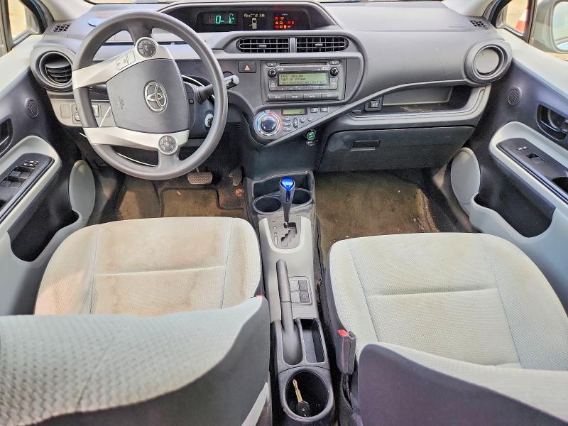 2013 Toyota Prius c VIN JTDKDTB35D1031718 COPART salvage auction — WATER/FLOOD, NJ - CERT OF TITLE-SALVAGE FLOOD (P), sold $625 on 2026-07-22 (photo 8)