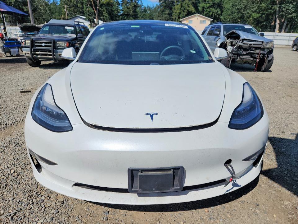 2019 Tesla Model 3 VIN 5YJ3E1EB4KF454223 COPART salvage auction — UNDERCARRIAGE, Wa - Vehicle Cert Of Ownership-Titl (P), sold $5,300 on 2026-07-31 (photo 5)