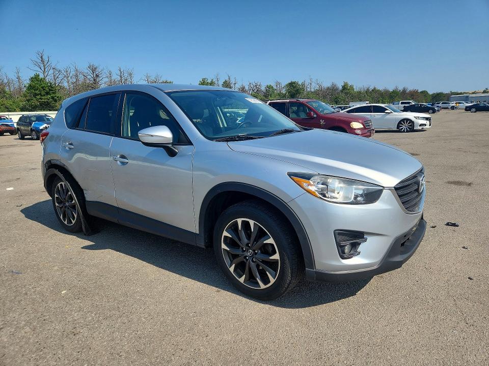 2016 Mazda Cx-5 VIN JM3KE4DY1G0713671 COPART salvage auction — REAR END, NY - MV-907A SALVAGE CERTIFICATE, sold $3,900 on 2026-07-20 (photo 4)
