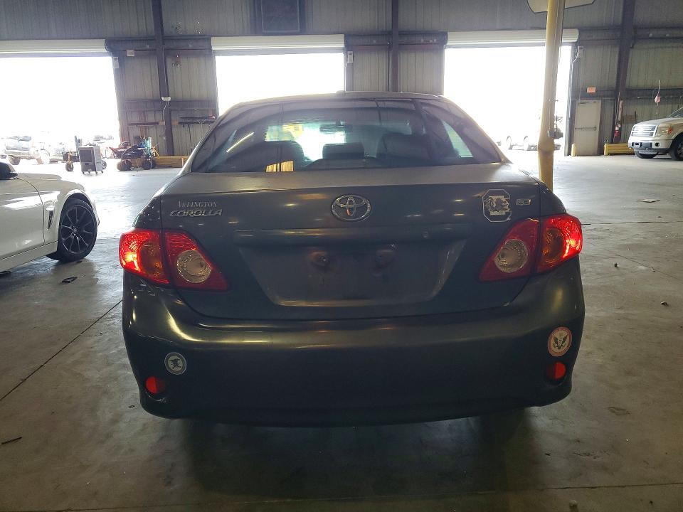 2009 Toyota Corolla VIN JTDBL40E199054368 COPART salvage auction — NORMAL WEAR, Fl - Certificate Of Title, sold $1,600 on 2026-07-22 (photo 6)